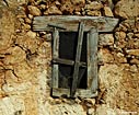  Window of a ruined house in Aradena