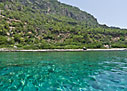 Leaving the chapel of Agios Antonios by boat