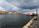 Dark clouds over Chania harbour