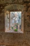 Looking through a window at the monastery of Katholiko