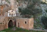The monastery of Katholiko . Note the huge olive tree growing out of the ruined building. It has not been pruned for over a 100 years.
