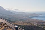 View of the coastline from the road that links Hora Sfakion to the North of the island. Beyond the village of Komitades (in the foreground) you see Frangokastello and the coastal plain behind it